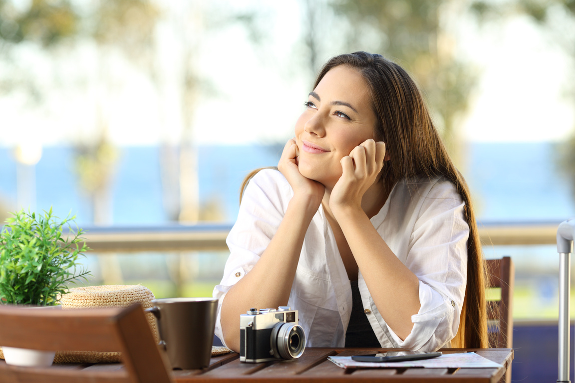 Woman dreaming during a beach travel