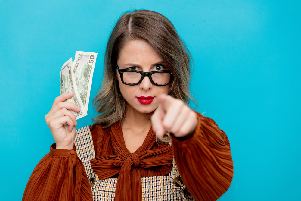 Young Woman with Money in Hand